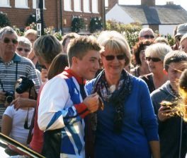 (Sam and admirers in the square)